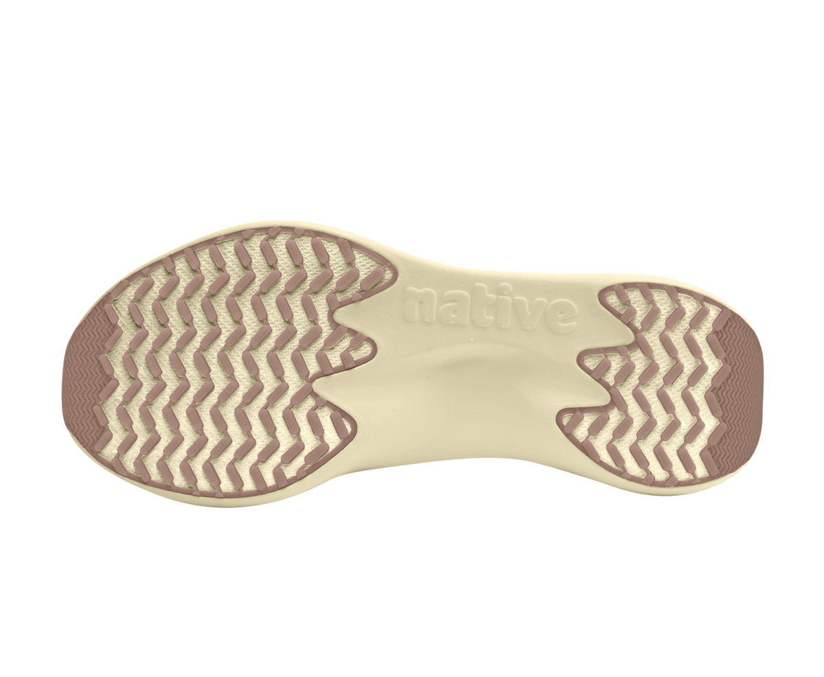 Bottom view of a Native Shoes Apollo 10 | Chameleon Pink / Taos Tan Footwear in Chameleon Pink / Taos Tan