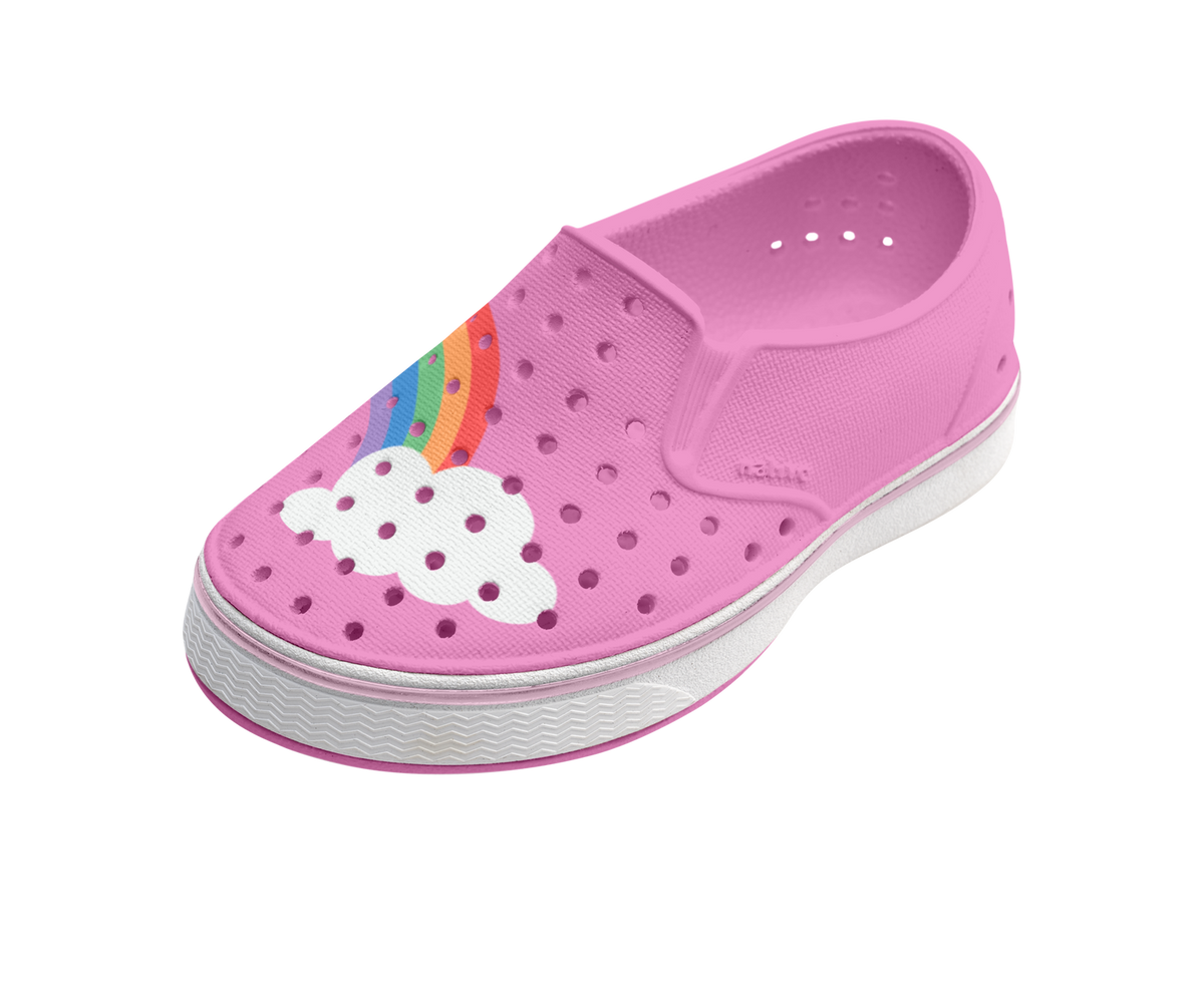 Angled view of a Native Shoes Kids Miles Block Kids | Malibu Pink / Shell White / Rainbow Block Footwear in Malibu Pink / Shell White / Rainbow Block