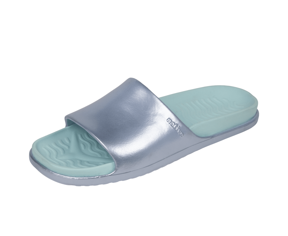 Angled view of a Native Shoes Spencer Lx Wanderfoam Metallic | Skyway Blue Metallic / Harbor Blue Footwear in Skyway Blue Metallic / Harbor Blue