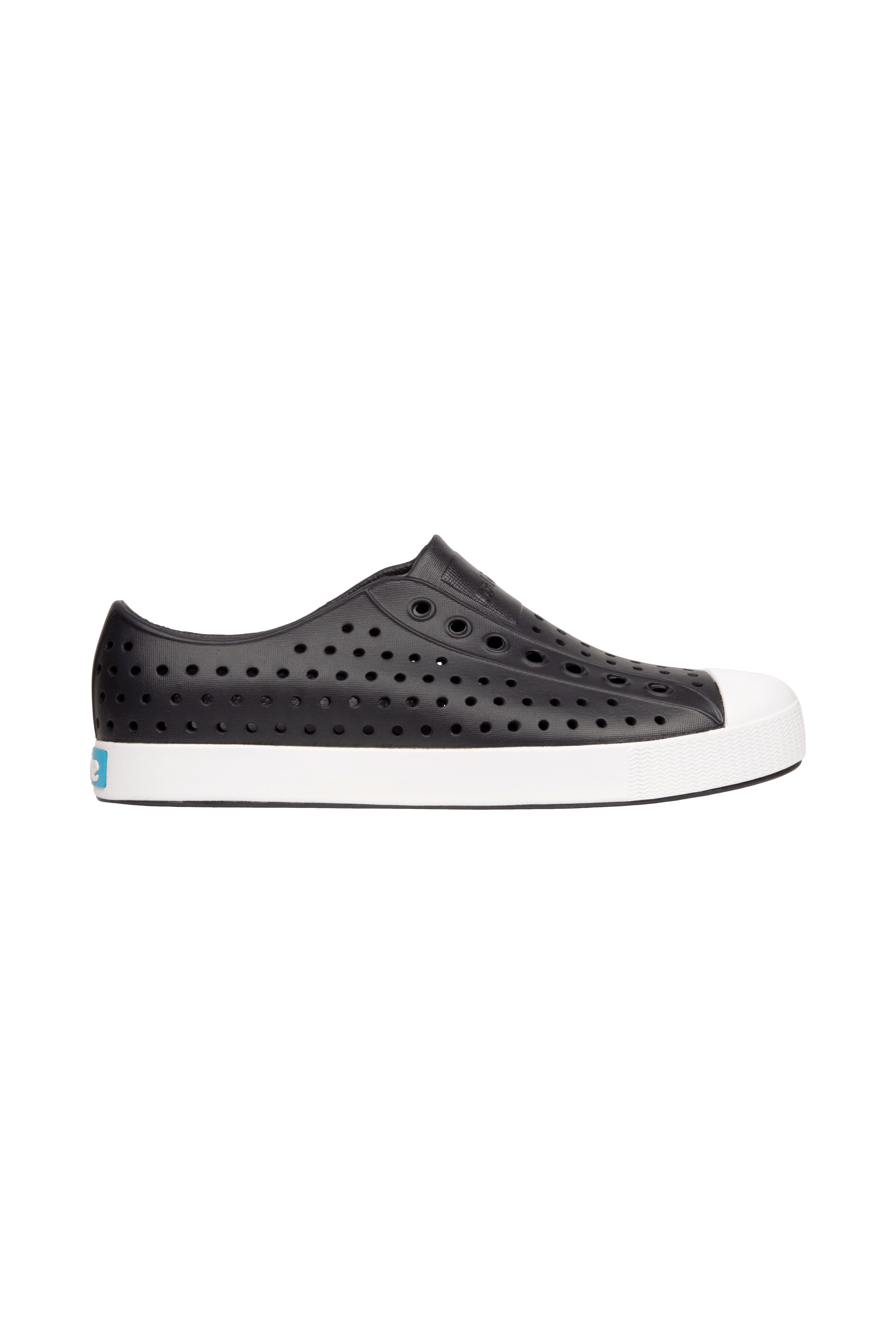 Side view of a Native Shoes Adults Jefferson Footwear in Jiffy Black / Shell White