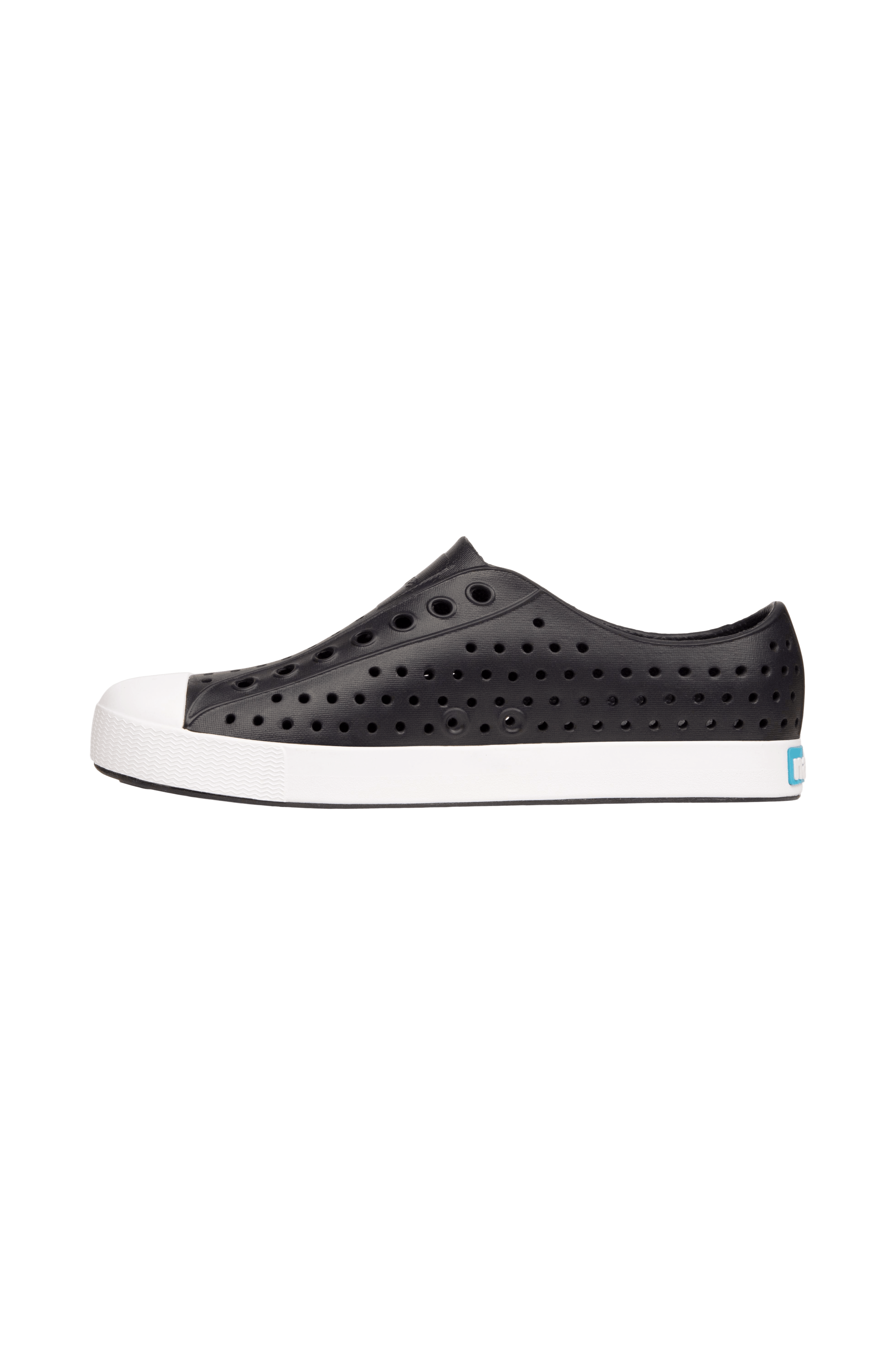 Angled view of a Native Shoes Jefferson | Jiffy Black / Shell White Footwear in Jiffy Black / Shell White
