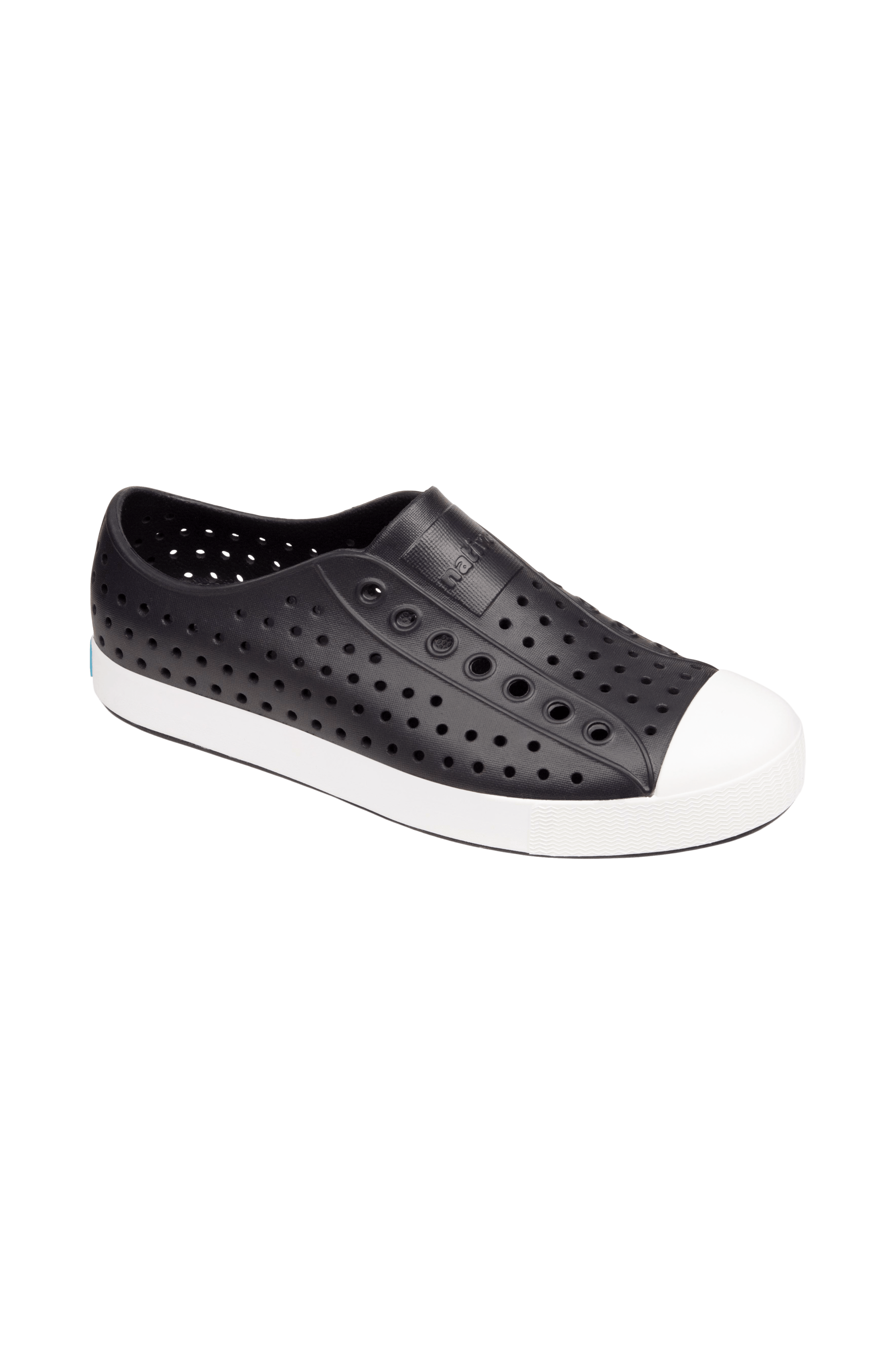Bottom view of a Native Shoes Jefferson | Jiffy Black / Shell White Footwear in Jiffy Black / Shell White