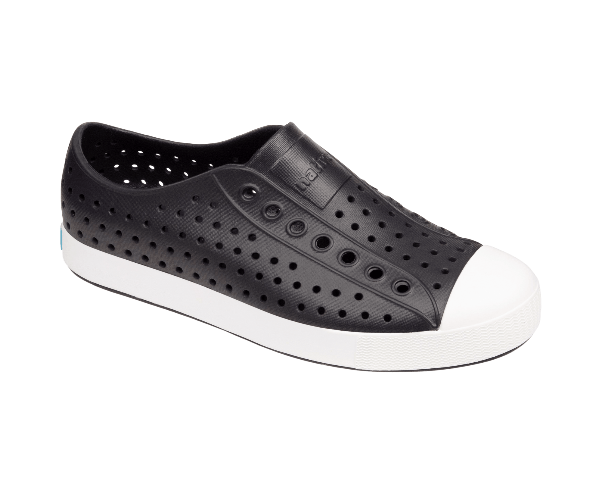 Bottom view of a Native Shoes Jefferson | Jiffy Black / Shell White Footwear in Jiffy Black / Shell White