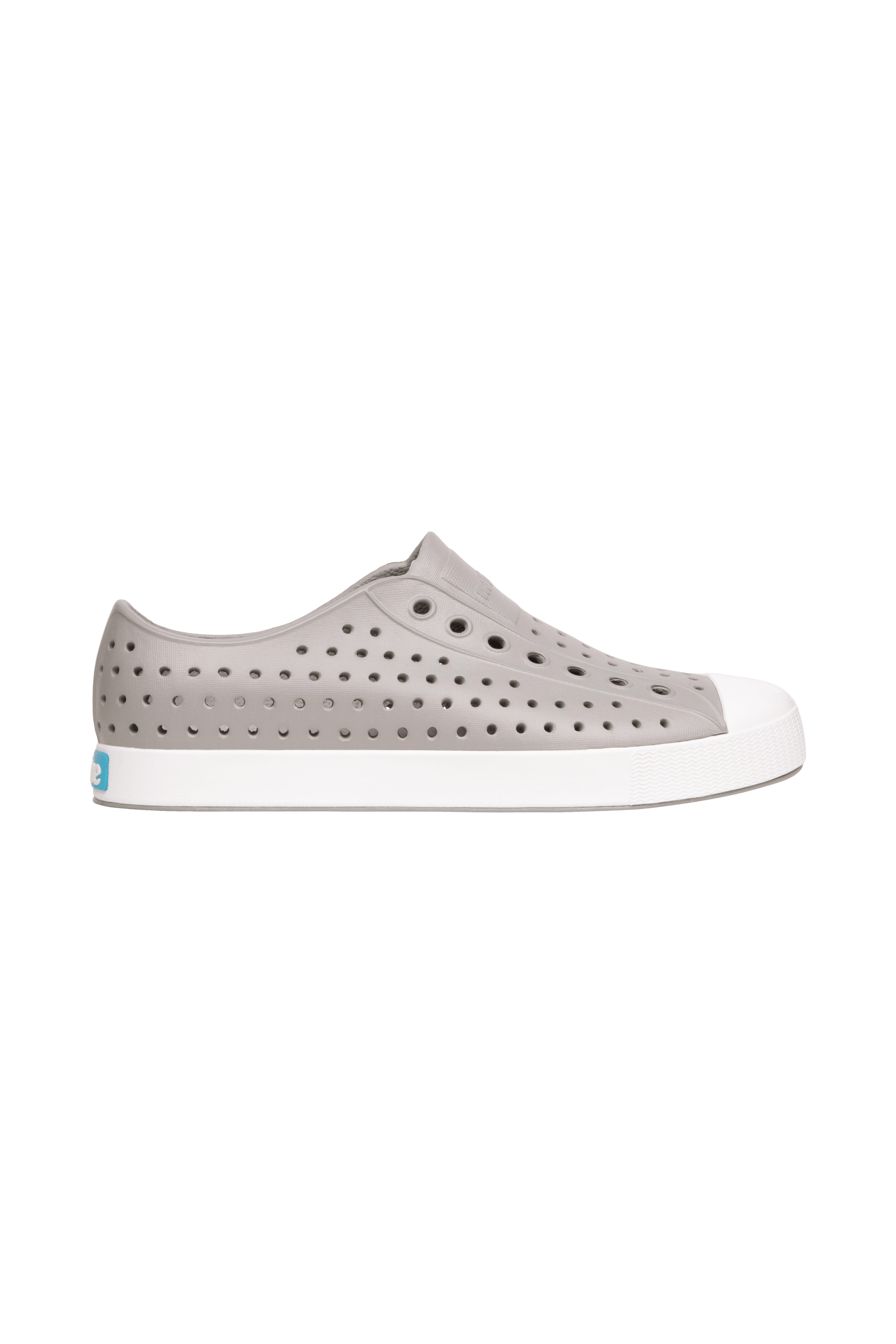 Side view of a Native Shoes Adults Jefferson Footwear in Pigeon Grey / Shell White