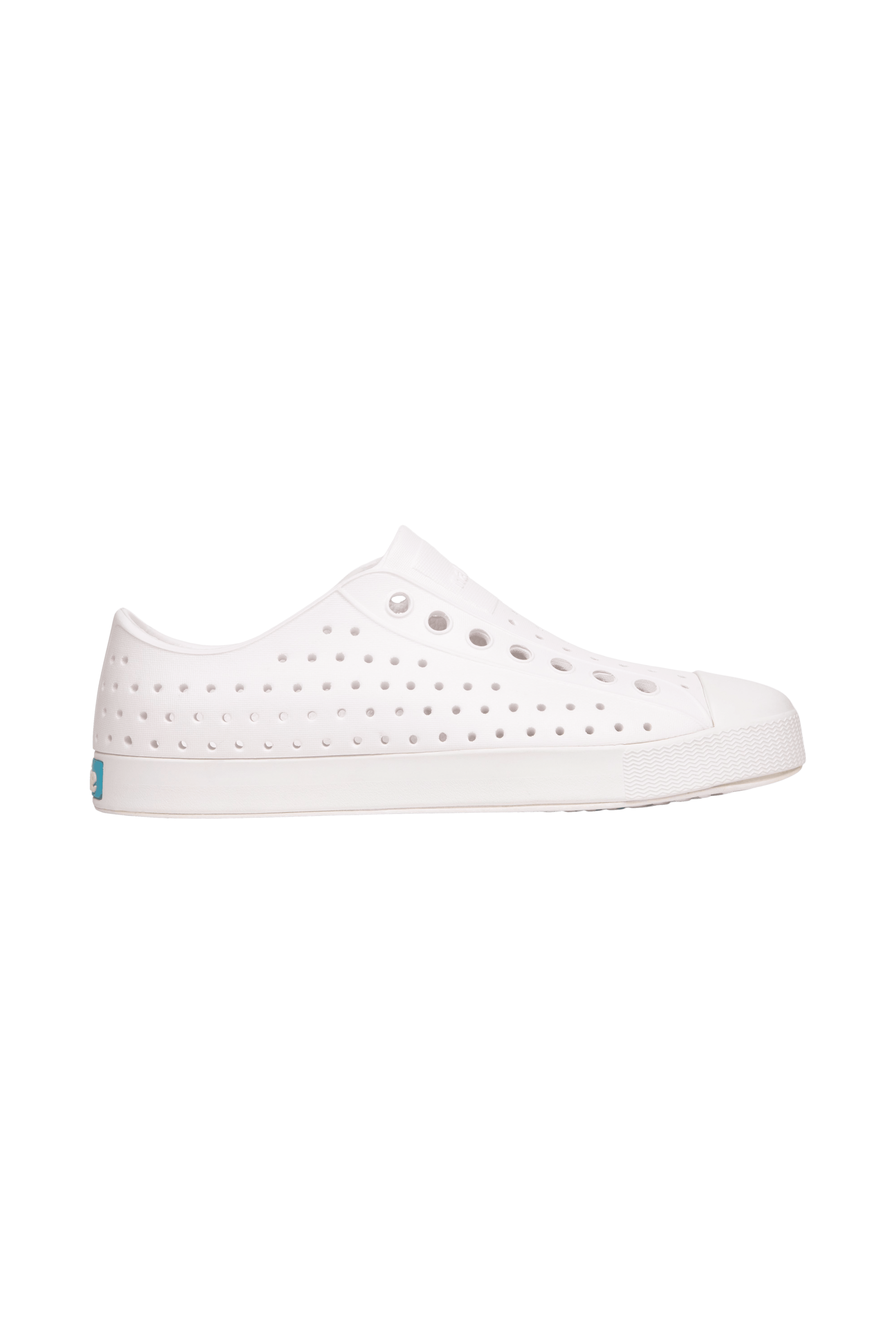 Side view of a Native Shoes Adults Jefferson Footwear in Shell White / Shell White