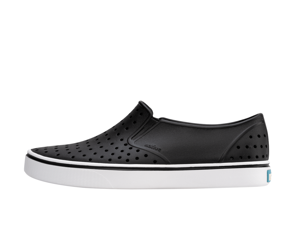 Side view of a Native Shoes Adults Miles Footwear in Jiffy Black / Shell White