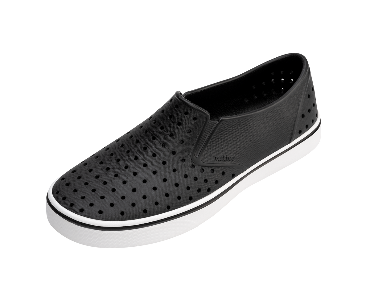 Angled view of a Native Shoes Miles | Jiffy Black / Shell White Footwear in Jiffy Black / Shell White
