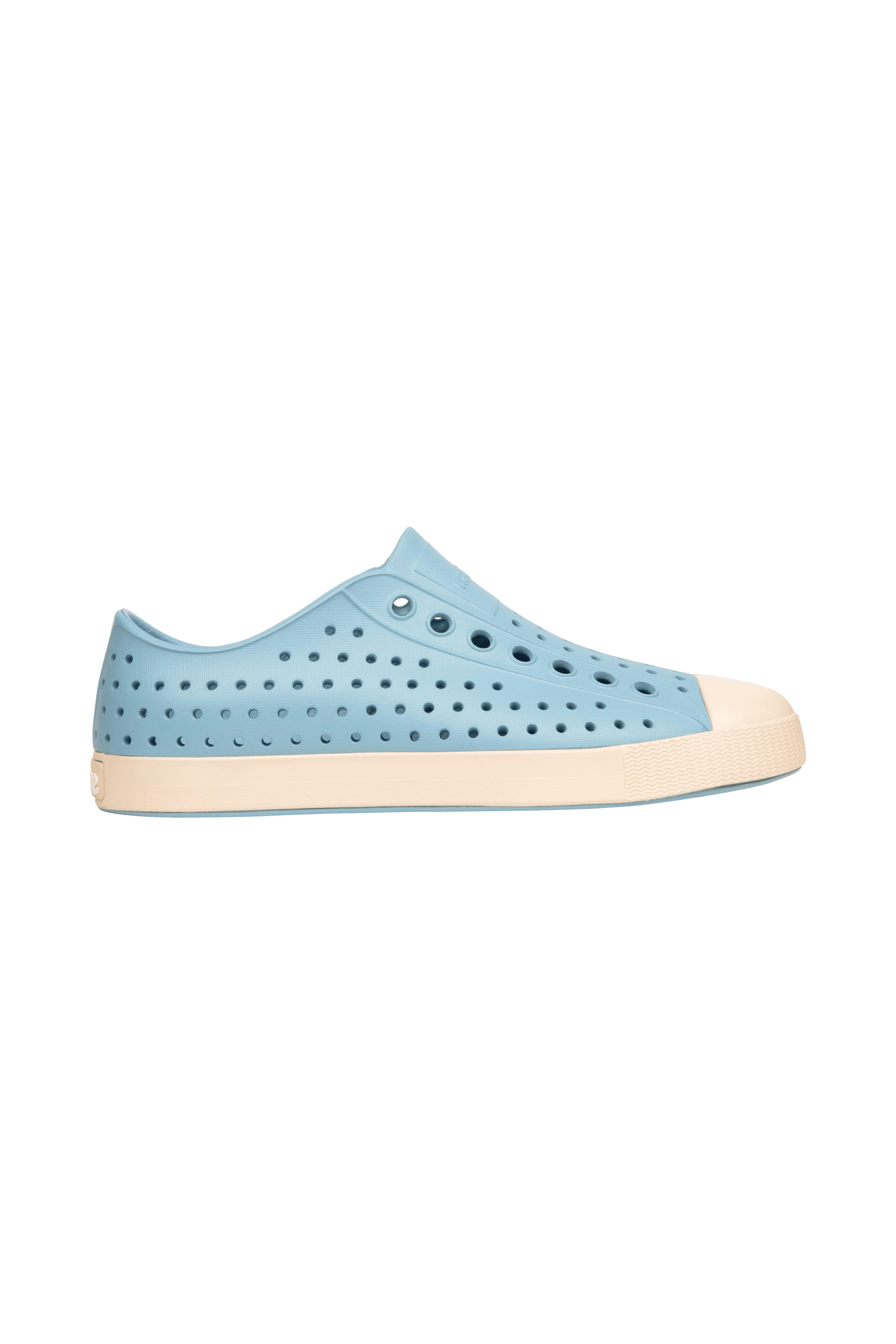 Side view of a Native Shoes Adults Jefferson Footwear in Flux Blue / Bone White