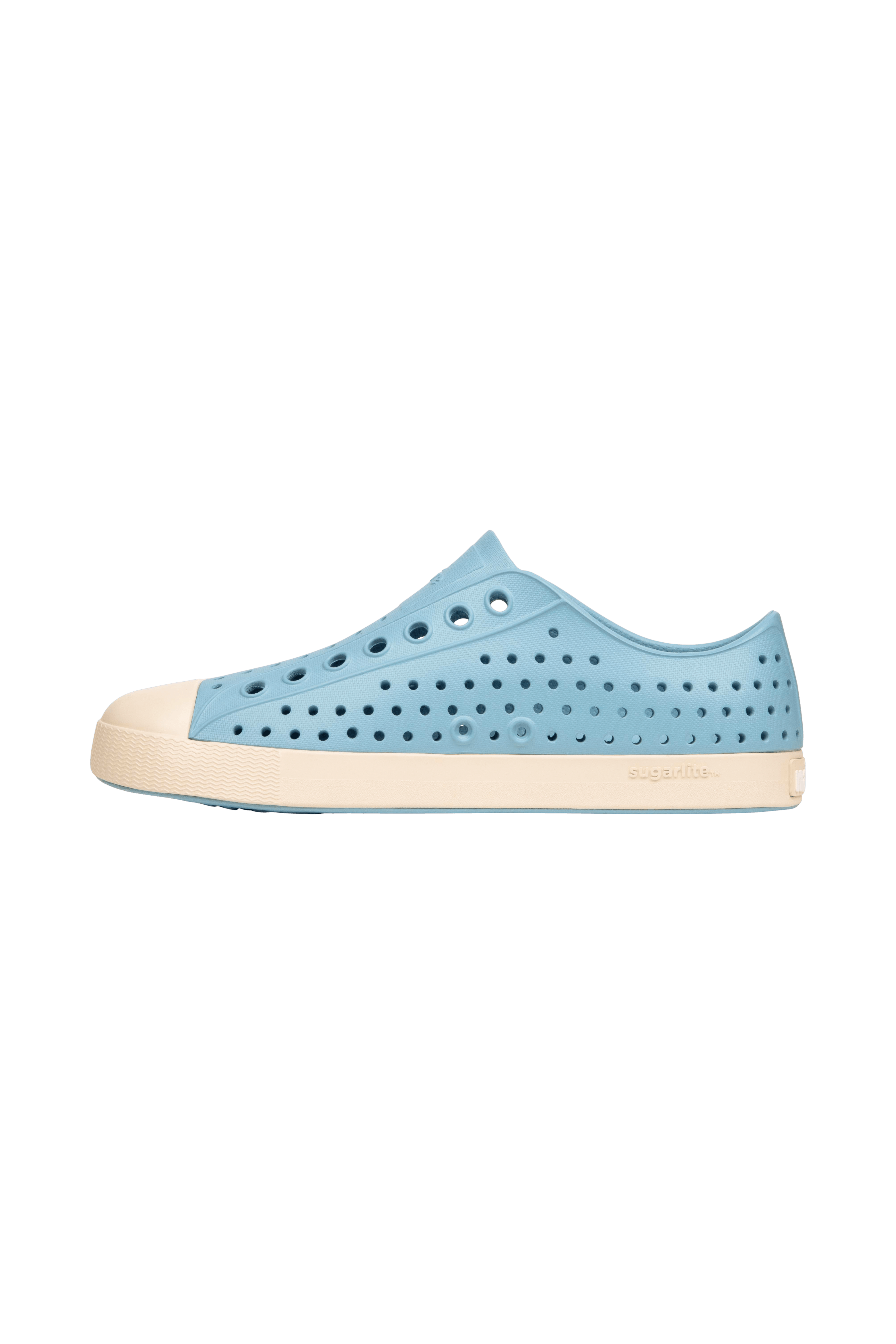 Angled view of a Native Shoes Jefferson | Flux Blue / Bone White Footwear in Flux Blue / Bone White