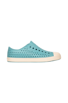 Side view of a Native Shoes Adults Jefferson Footwear in Tktbl/Bnwht