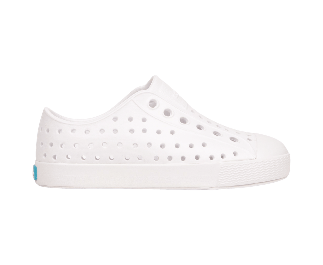 Side view of a Native Shoes Kids Jefferson Kids Footwear in Shell White / Shell White