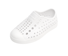 Angled view of a Native Shoes Kids Jefferson Kids | Shell White / Shell White Footwear in Shell White / Shell White