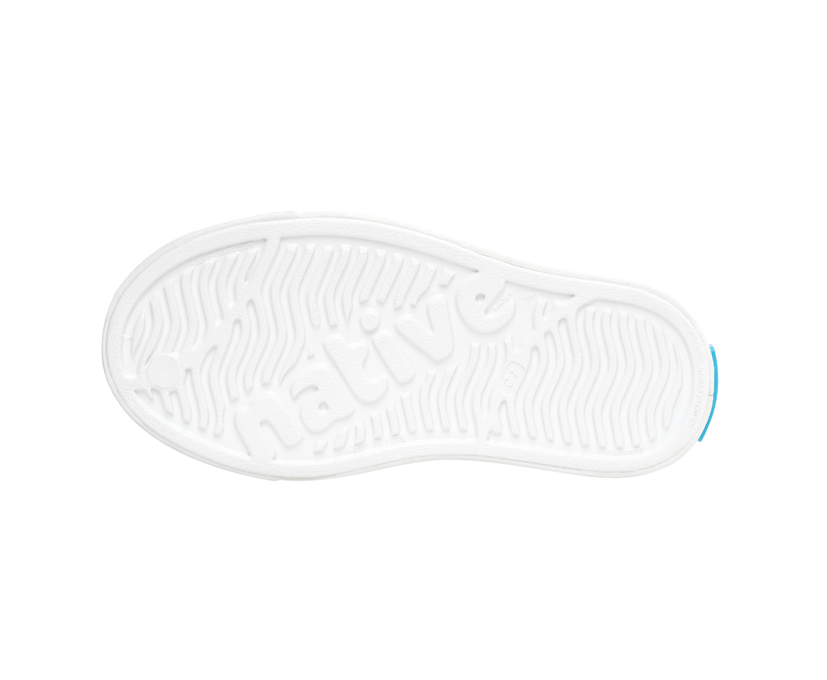 Bottom view of a Native Shoes Kids Jefferson Kids | Shell White / Shell White Footwear in Shell White / Shell White