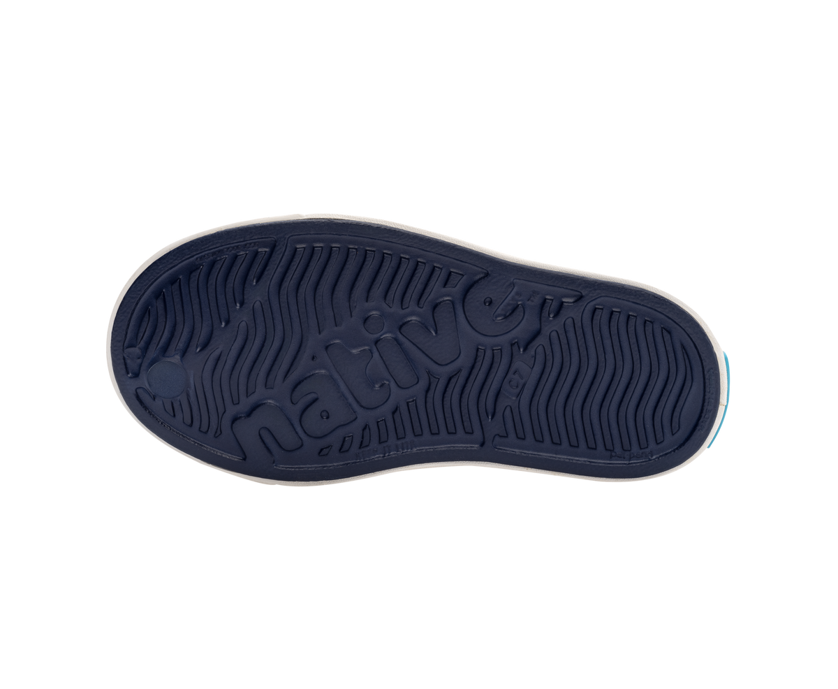 Bottom view of a Native Shoes Kids Jefferson Kids | Regatta Blue / Shell White Footwear in Regatta Blue / Shell White