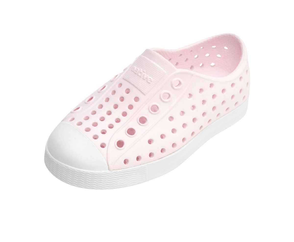 Angled view of a Native Shoes Kids Jefferson Kids | Milk Pink / Shell White Footwear in Milk Pink / Shell White