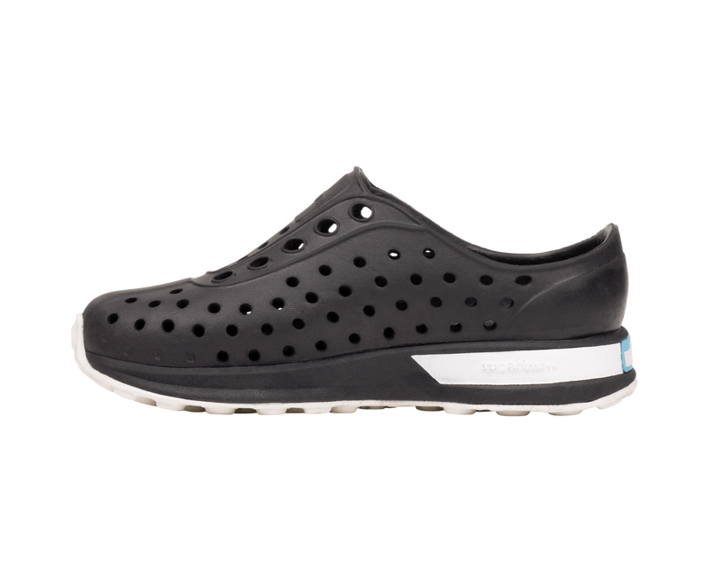 Angled view of a Native Shoes Kids Robbie Block Kids | Jfyblk/Jfyblk/Shlwht/Shlspckrb Footwear in Jfyblk/Jfyblk/Shlwht/Shlspckrb