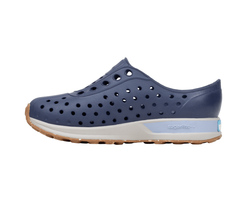 Angled view of a Native Shoes Kids Robbie Block Kids | Rgtabl/Slkgry/Kingr/Uvspckrb Footwear in Rgtabl/Slkgry/Kingr/Uvspckrb