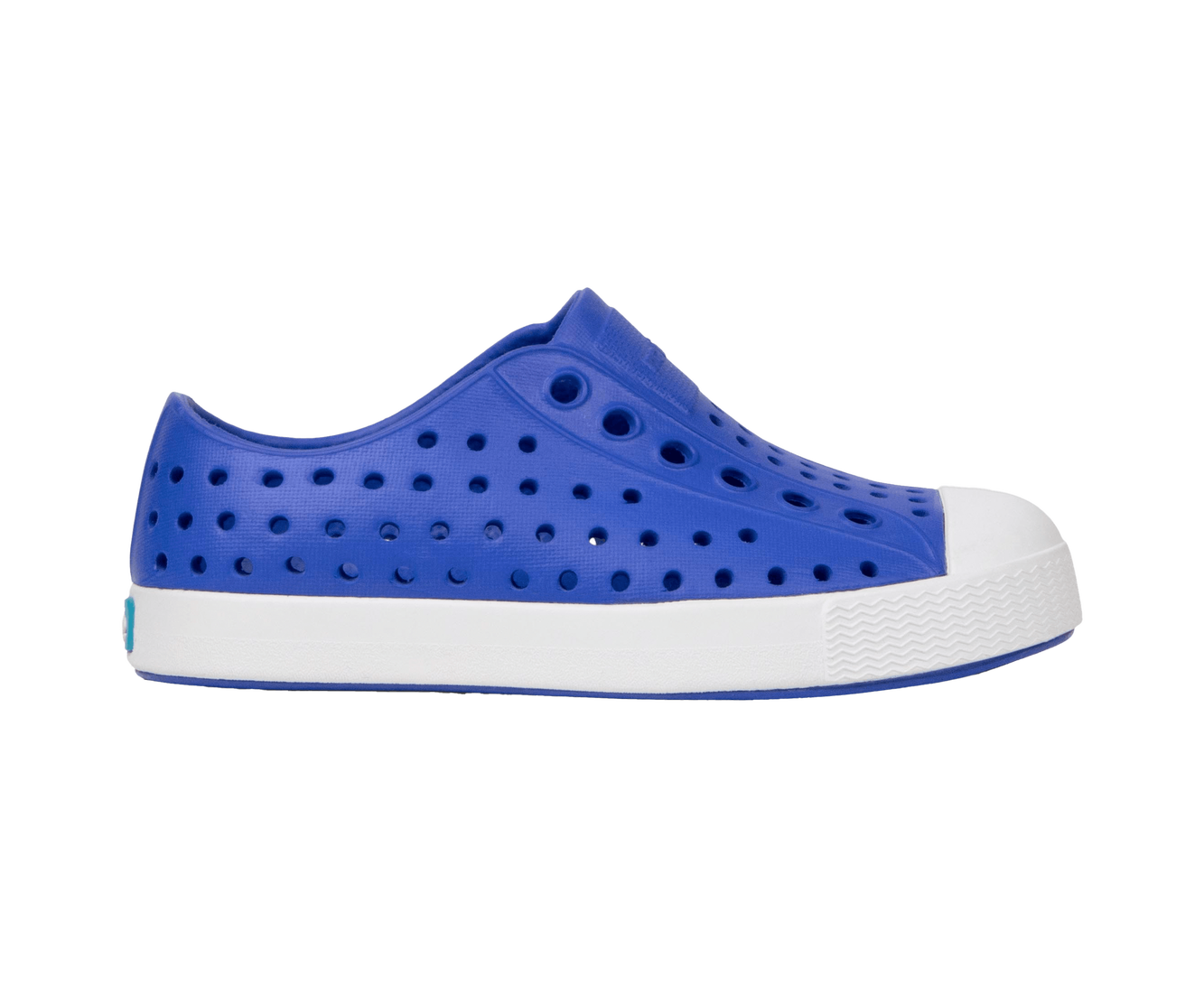 Side view of a Native Shoes Kids Jefferson Kids Footwear in Uv Blue / Shell White