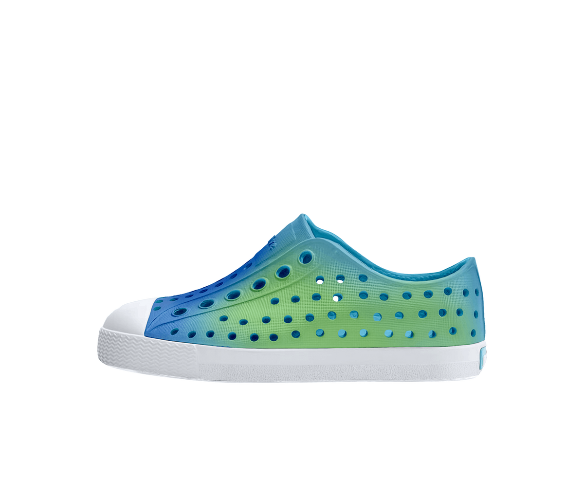 Side view of a Native Shoes Kids Jefferson Print Kids Footwear in Aquarius Blue / Shell White / Hilly Uv Blur