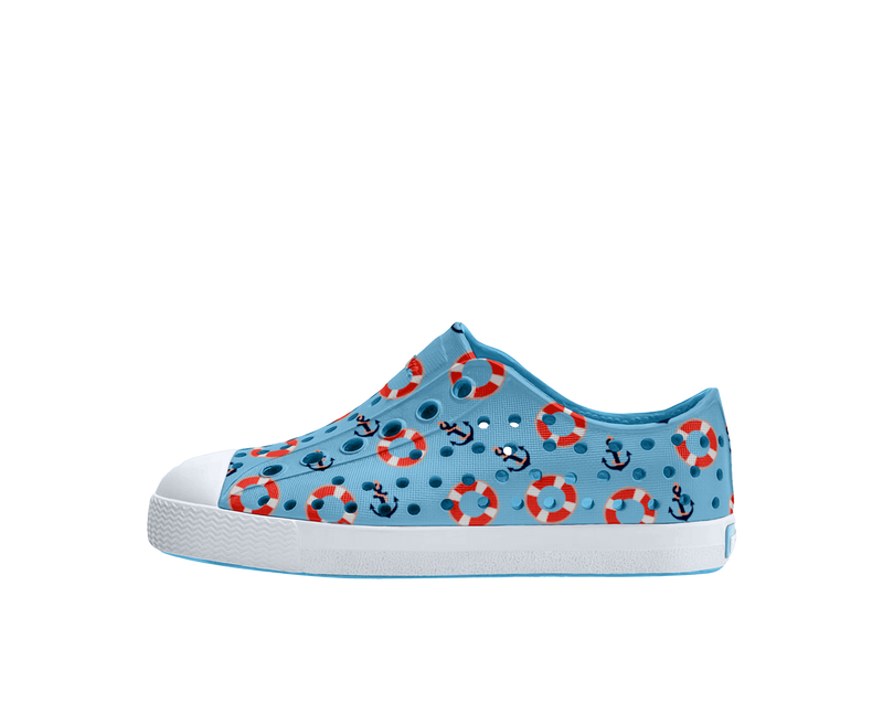 Side view of a Native Shoes Kids Jefferson Print Kids Footwear in Aquarius Blue / Shell White / Anchors