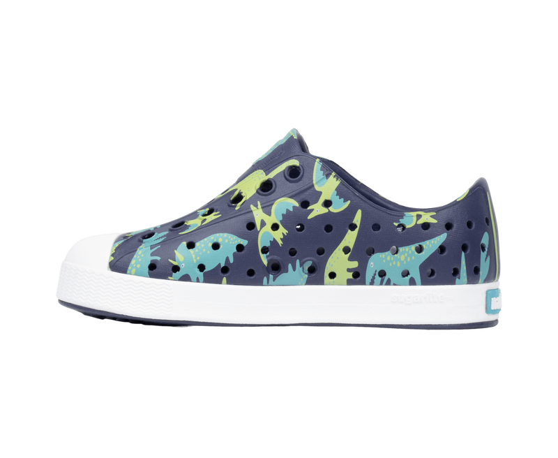 Angled view of a Native Shoes Kids Jefferson Print Kids | Rgtabl/Shlwht/Tnkdino Footwear in Rgtabl/Shlwht/Tnkdino