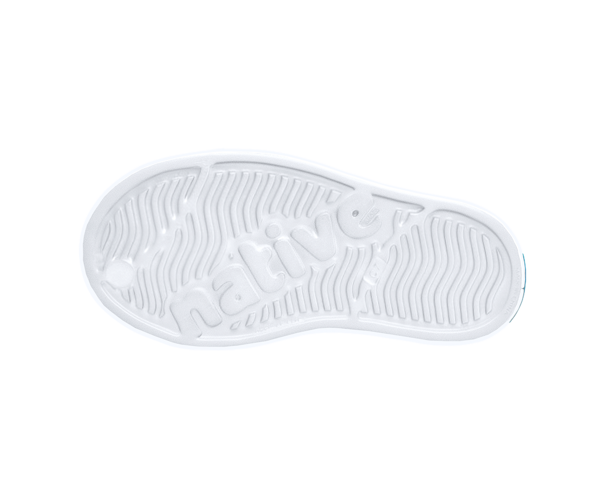 Bottom view of a Native Shoes Kids Jefferson Print Kids | Shell White / Shell White / Barely Taro Blur Footwear in Shell White / Shell White / Barely Taro Blur
