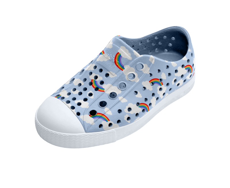 Angled view of a Native Shoes Kids Jefferson Print Kids | Skyway Blue / Shell White / Cloud Rainbow Footwear in Skyway Blue / Shell White / Cloud Rainbow