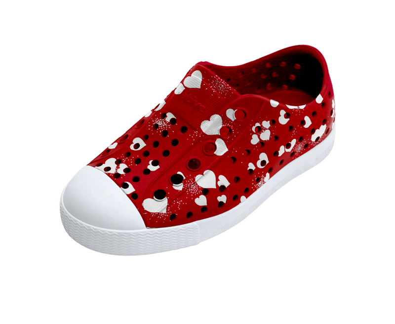 Angled view of a Native Shoes Kids Jefferson Print Kids | Ruby Red / Shell White / Heart Fireworks Footwear in Ruby Red / Shell White / Heart Fireworks