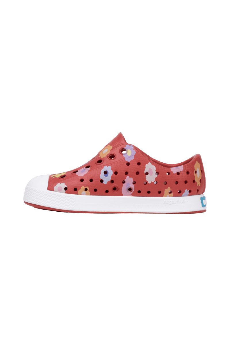 Angled view of a Native Shoes Kids Jefferson Print Kids | Rubyrd/Shlwht/Paradaisy Footwear in Rubyrd/Shlwht/Paradaisy