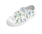 Angled view of a Native Shoes Kids Jefferson Print Kids | Shell White / Shell White / Flux Alpine Dino Footwear in Shell White / Shell White / Flux Alpine Dino