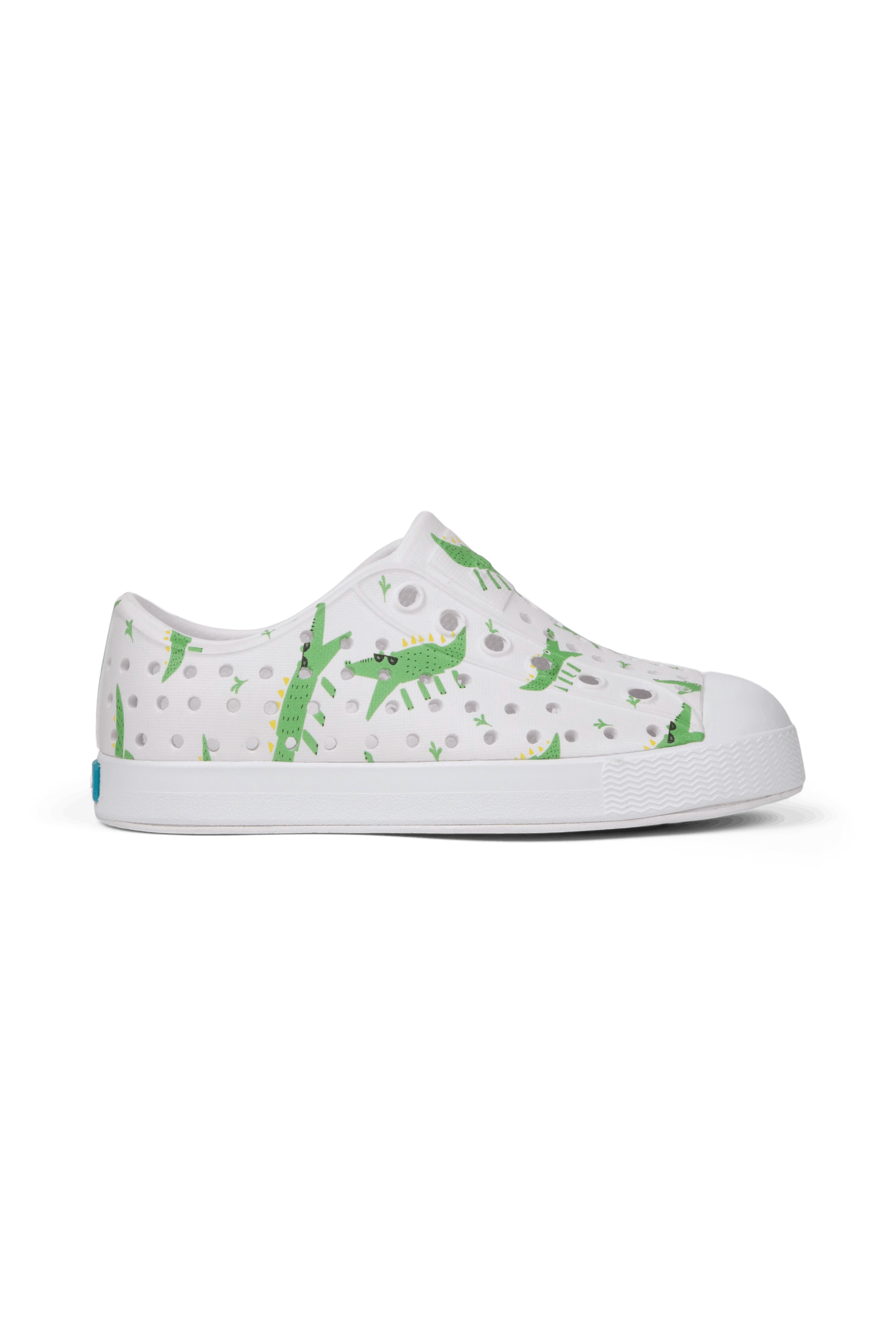 Side view of a Native Shoes Kids Jefferson Print Kids Footwear in Shell White / Shell White / Alligators