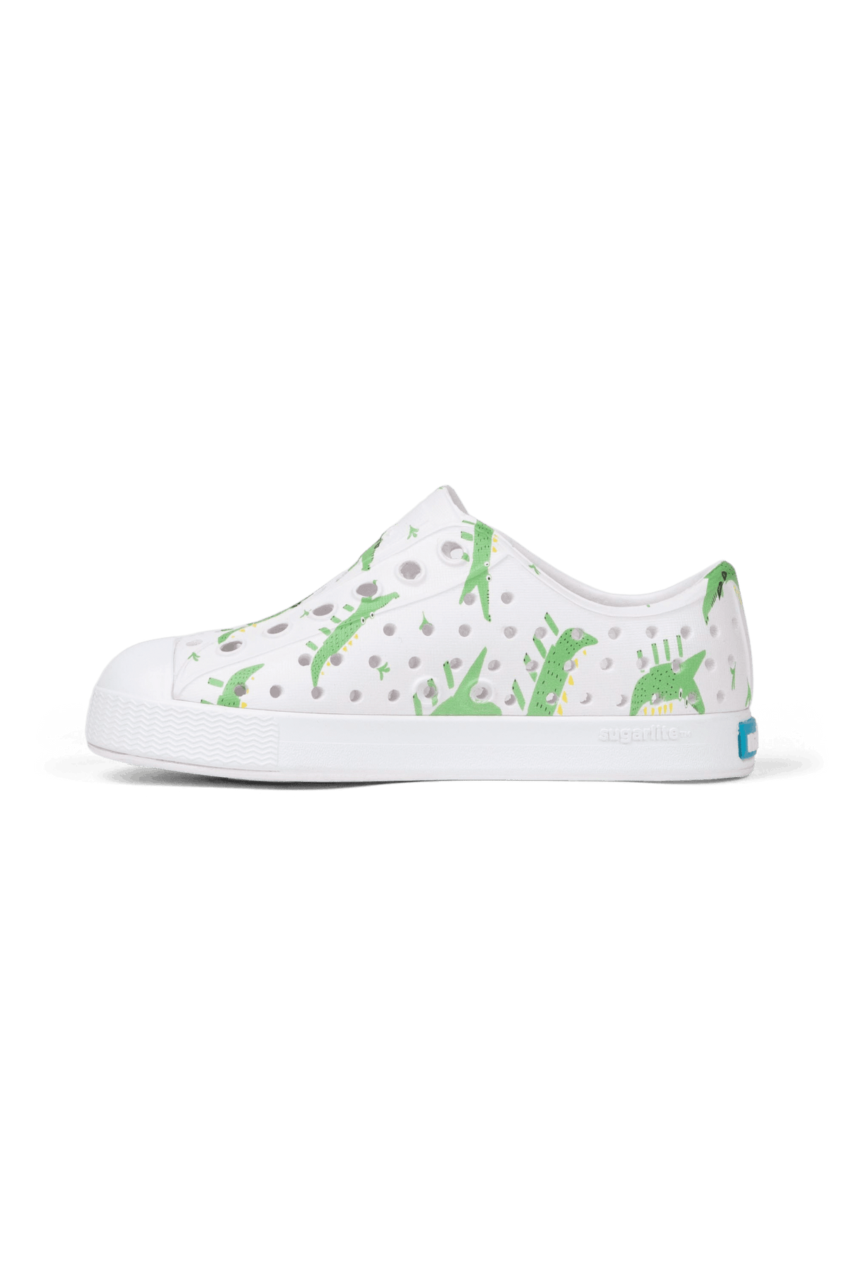 Bottom view of a Native Shoes Kids Jefferson Print Kids | Shell White / Shell White / Alligators Footwear in Shell White / Shell White / Alligators