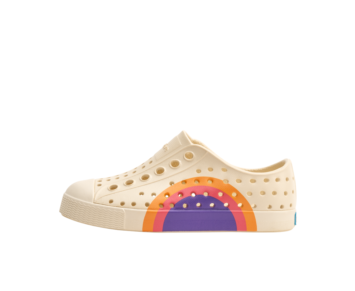Side view of a Native Shoes Kids Jefferson Block Kids Footwear in Bone White / Bone White / Apricot Dazzle Ultra Circle