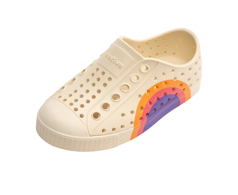 Angled view of a Native Shoes Kids Jefferson Block Kids | Bone White / Bone White / Apricot Dazzle Ultra Circle Footwear in Bone White / Bone White / Apricot Dazzle Ultra Circle