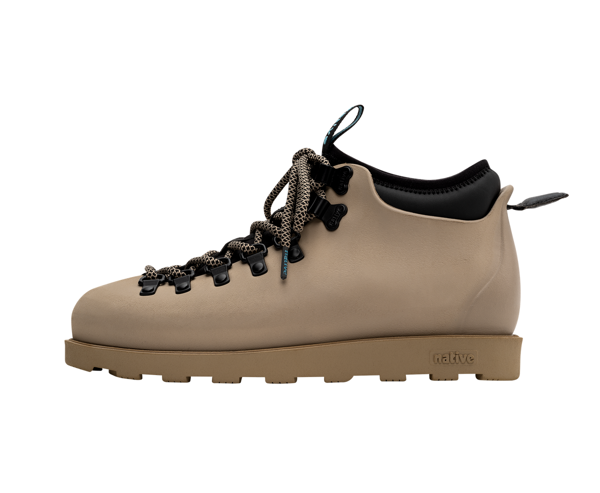 Side view of a Native Shoes Adults Fitzsimmons Citylite Footwear in Flax Tan / Flax Tan / Jiffy Black