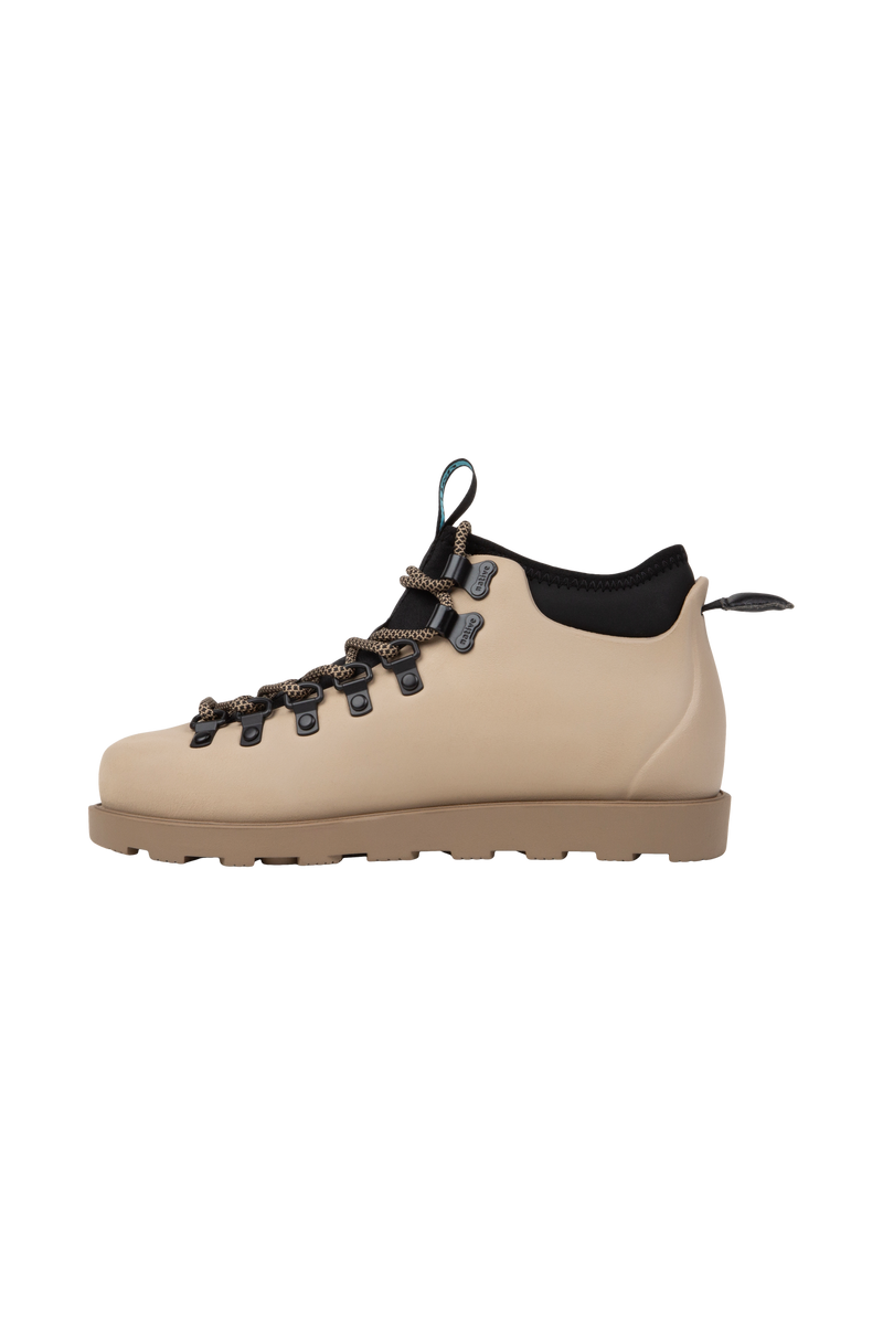 Angled view of a Native Shoes Fitzsimmons Citylite | Flax Tan / Flax Tan / Jiffy Black Footwear in Flax Tan / Flax Tan / Jiffy Black