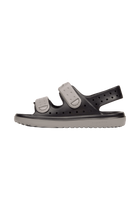 Angled view of a Native Shoes Kids Chase Kids | Jiffy Black / Satellite Grey Footwear in Jiffy Black / Satellite Grey