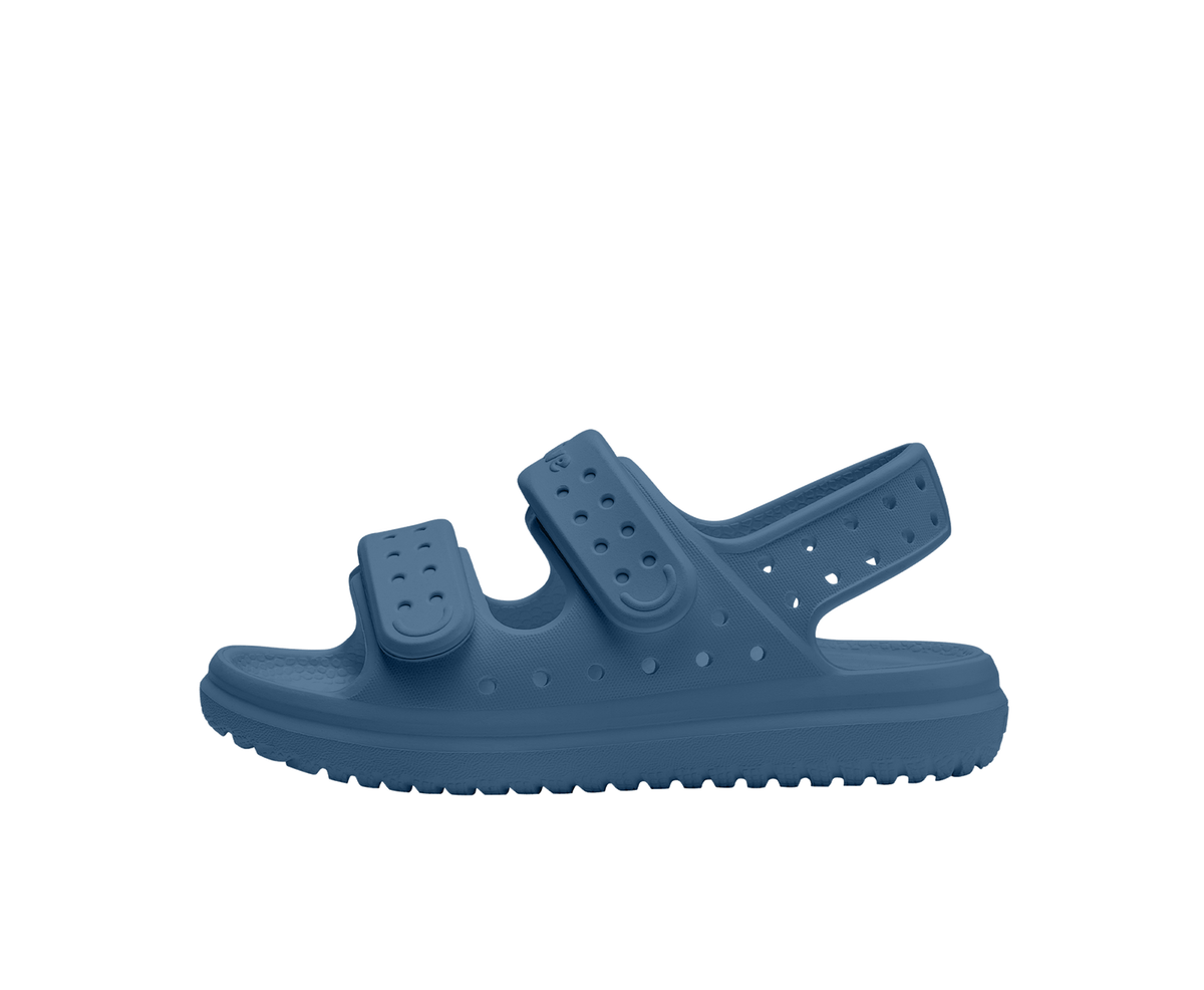 Side view of a Native Shoes Kids Chase Kids Footwear in Oasis Blue / Oasis Blue
