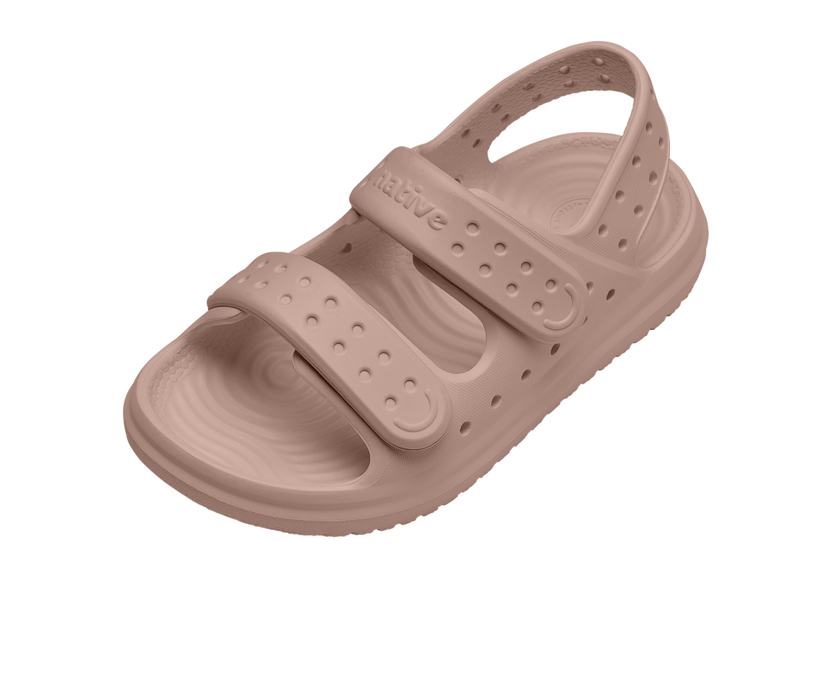 Angled view of a Native Shoes Kids Chase Kids | Chameleon Pink / Chameleon Pink Footwear in Chameleon Pink / Chameleon Pink