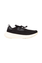 Side view of a Native Shoes Adults Apollo 10 Footwear in Jiffy Black / Tapioca Off White
