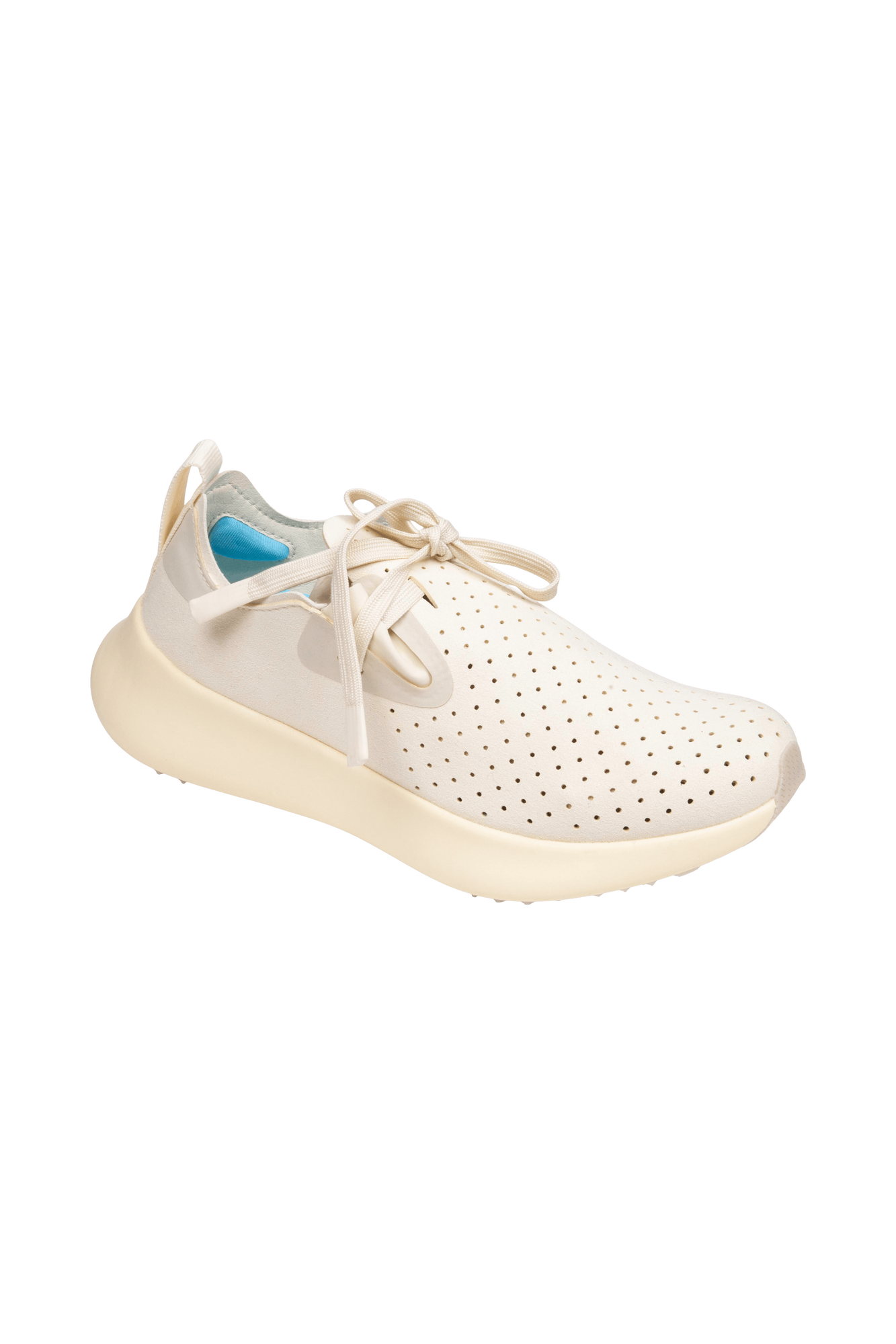Angled view of a Native Shoes Apollo 10 | Bone White / Tapioca Off White Footwear in Bone White / Tapioca Off White