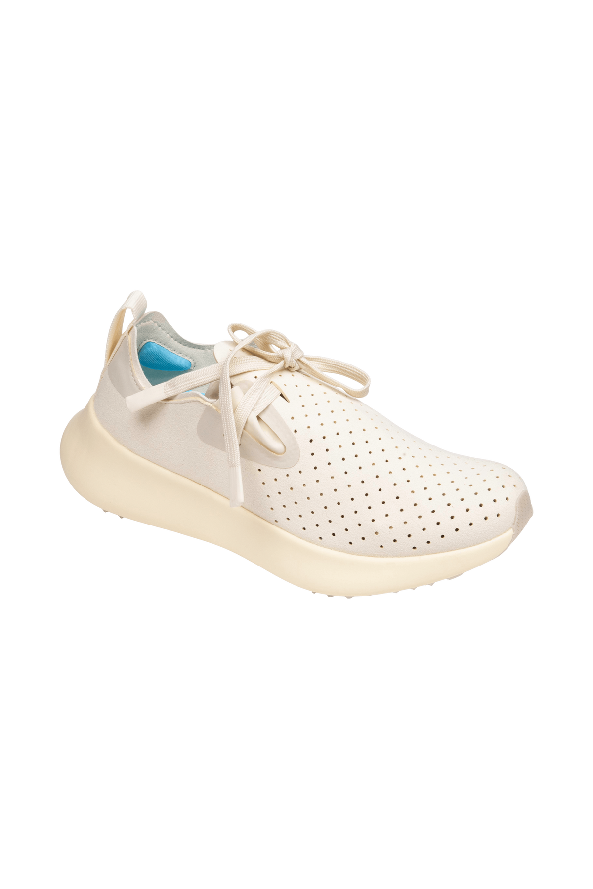Angled view of a Native Shoes Apollo 10 | Bone White / Tapioca Off White Footwear in Bone White / Tapioca Off White
