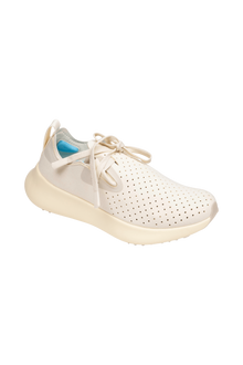 Angled view of a Native Shoes Apollo 10 | Bone White / Tapioca Off White Footwear in Bone White / Tapioca Off White