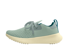Side view of a Native Shoes Adults Apollo 10 Footwear in Relax Green / Tapioca Off White