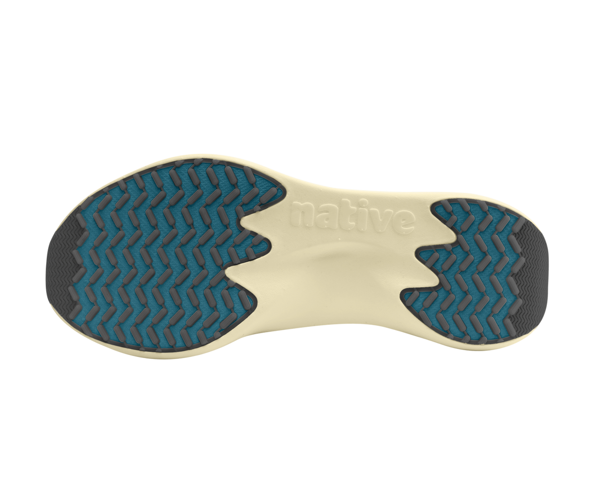 Bottom view of a Native Shoes Apollo 10 | Relax Green / Tapioca Off White Footwear in Relax Green / Tapioca Off White