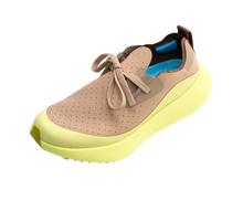 Angled view of a Native Shoes Apollo 10 Roam | Flax Tan / Peaceful Green Footwear in Flax Tan / Peaceful Green