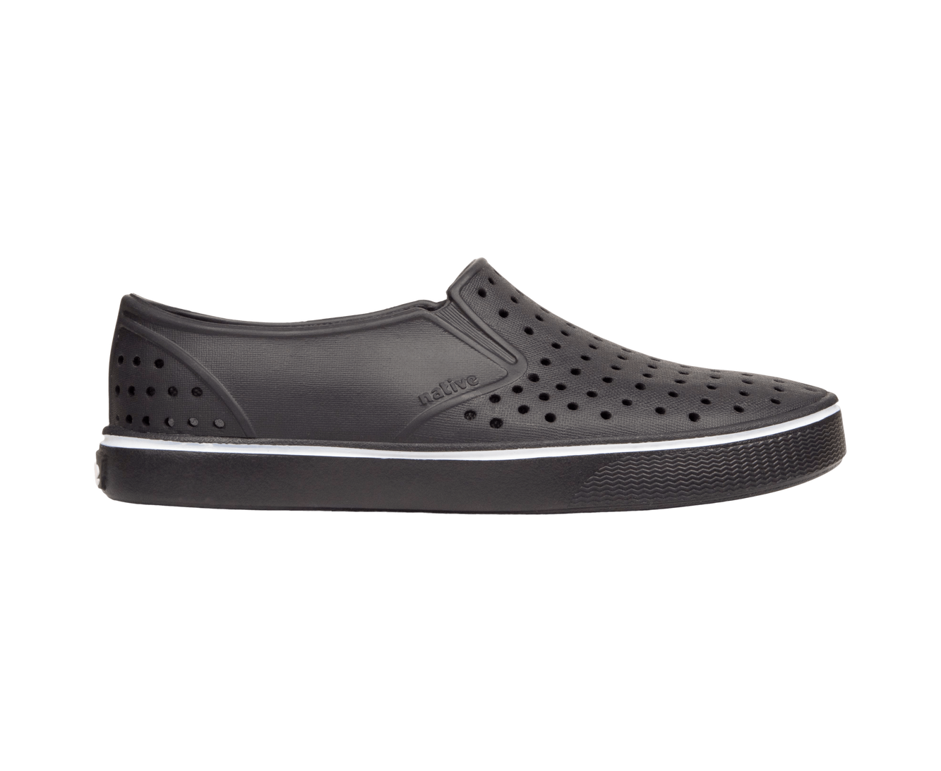 Side view of a Native Shoes Adults Miles Wanderfoam Footwear in Jiffy Black / Jiffy Black