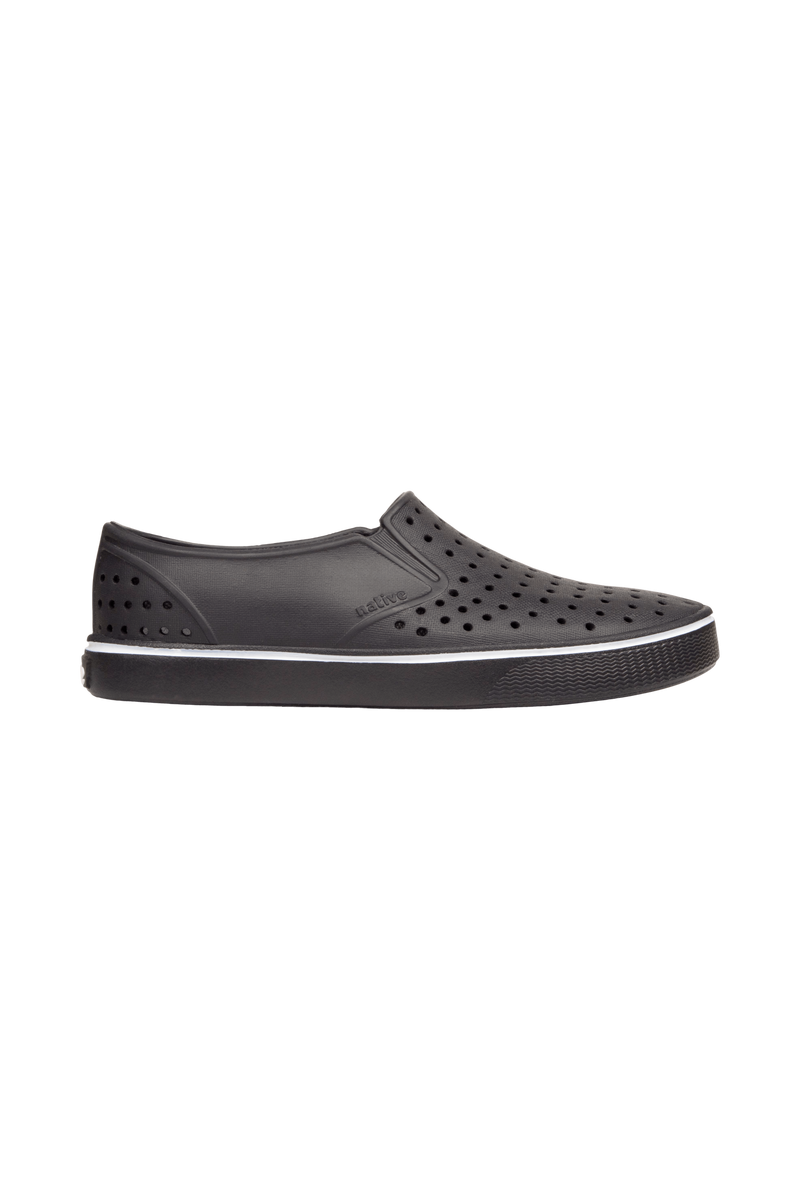Side view of a Native Shoes Adults Miles Wanderfoam Footwear in Jiffy Black / Jiffy Black