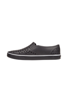 Angled view of a Native Shoes Miles Wanderfoam | Jiffy Black / Jiffy Black Footwear in Jiffy Black / Jiffy Black