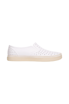 Side view of a Native Shoes Adults Miles Wanderfoam Footwear in Shell White / Bone White